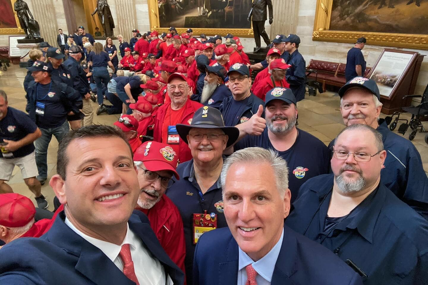 Rep. Valadao and Speaker McCarthy take pictures with veterans in the Capitol