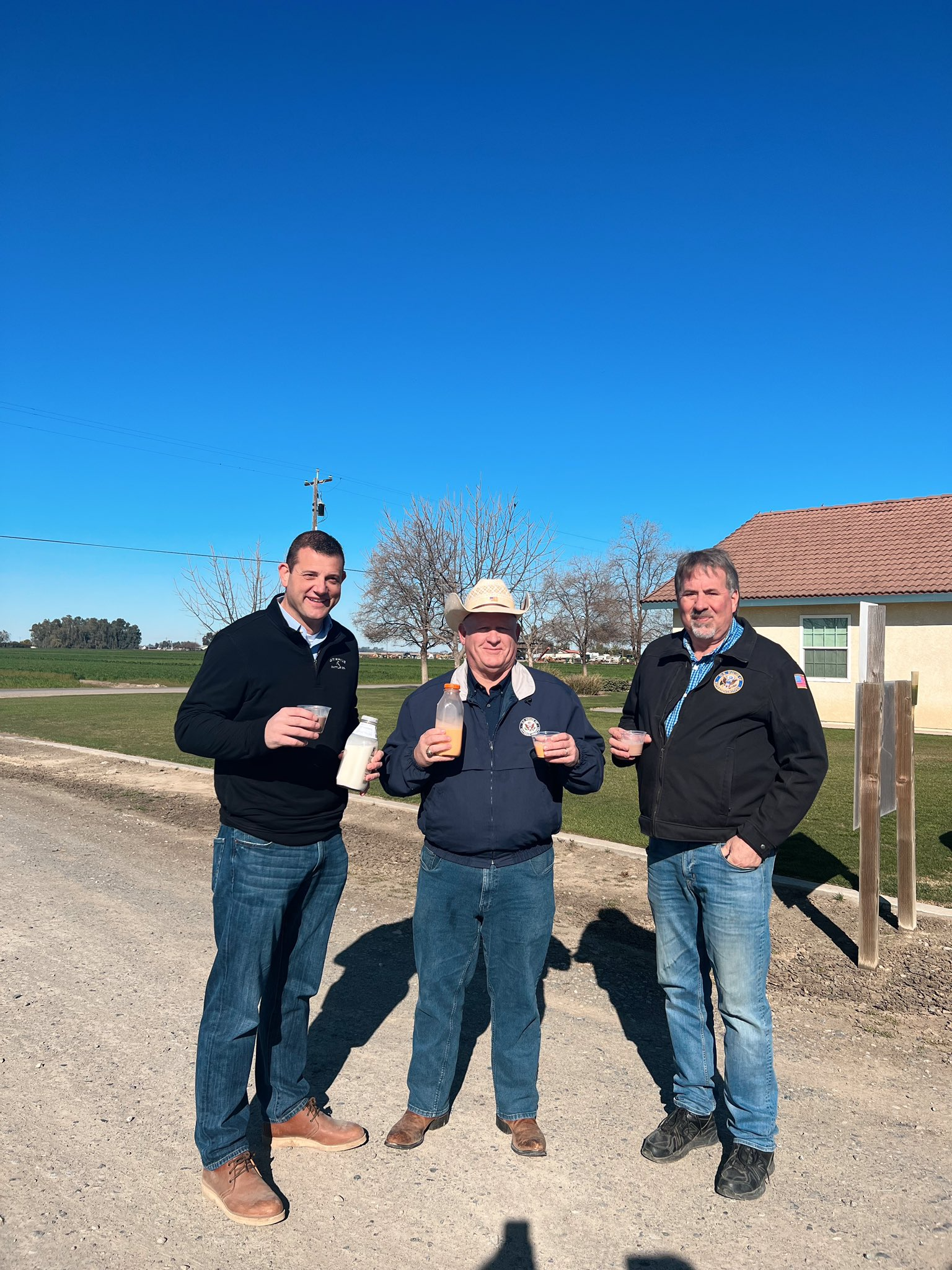 Rep. Valadao shares some California milk with Chairman Thompson and Rep. LaMalfa